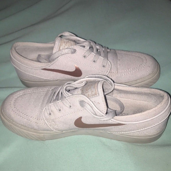 white and gold janoskis